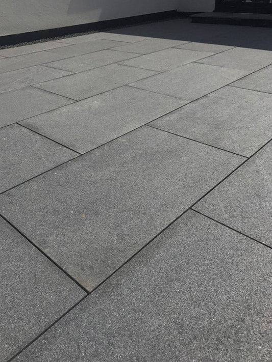 Black Granite Paving Slabs – flamed surface natural stone with consistent deep black finish