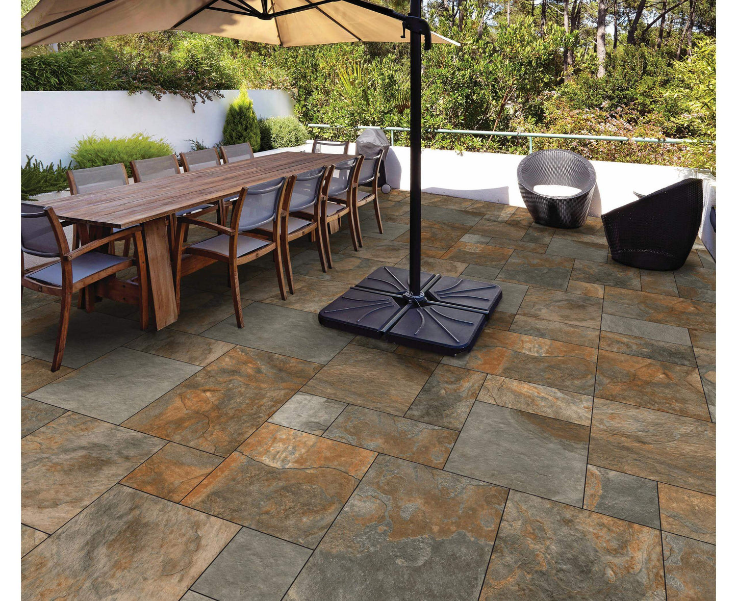 Bracken Bronze paving slabs featuring rich bronze and brown tones with a natural textured surface, perfect for warm and rustic outdoor spaces.