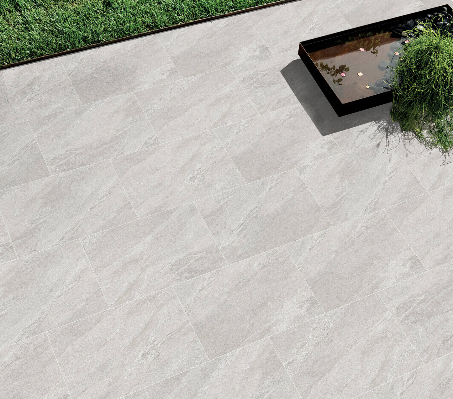 Smoke Grey paving slabs with soft smoky grey tones and a natural stone texture, perfect for contemporary outdoor patios and walkways.