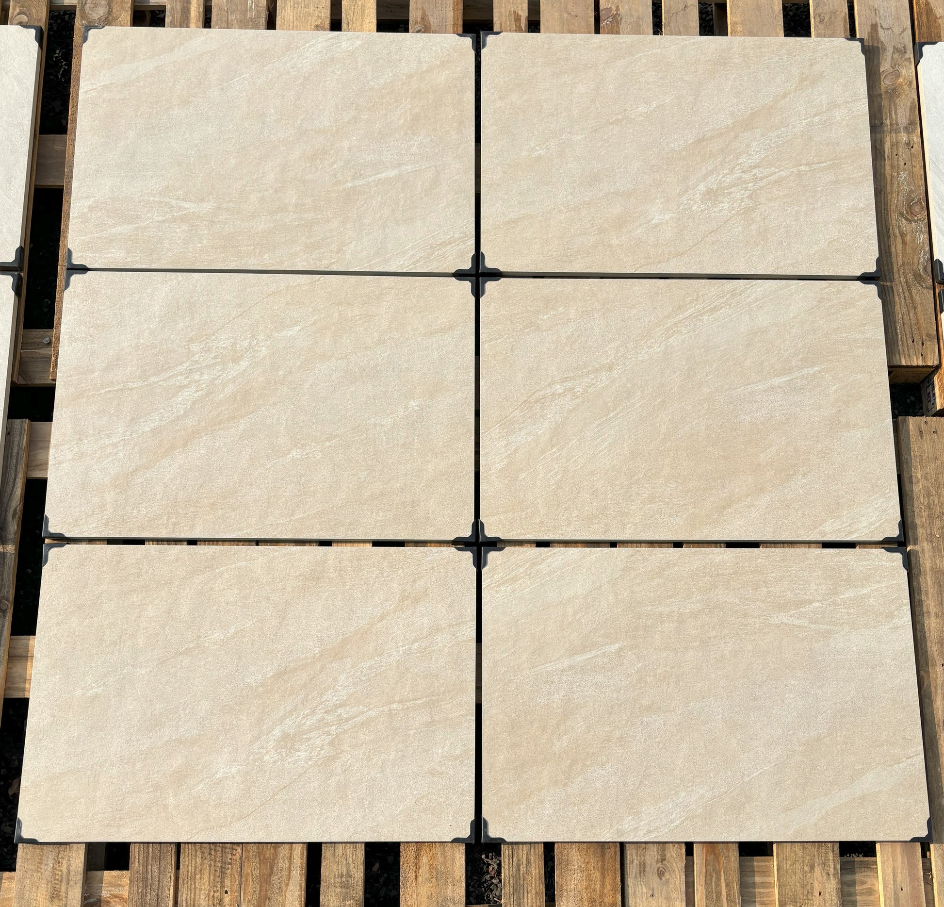 Dome Beige Porcelain Paving Slabs β smooth beige porcelain tiles with a subtle texture, ideal for durable and stylish outdoor patios