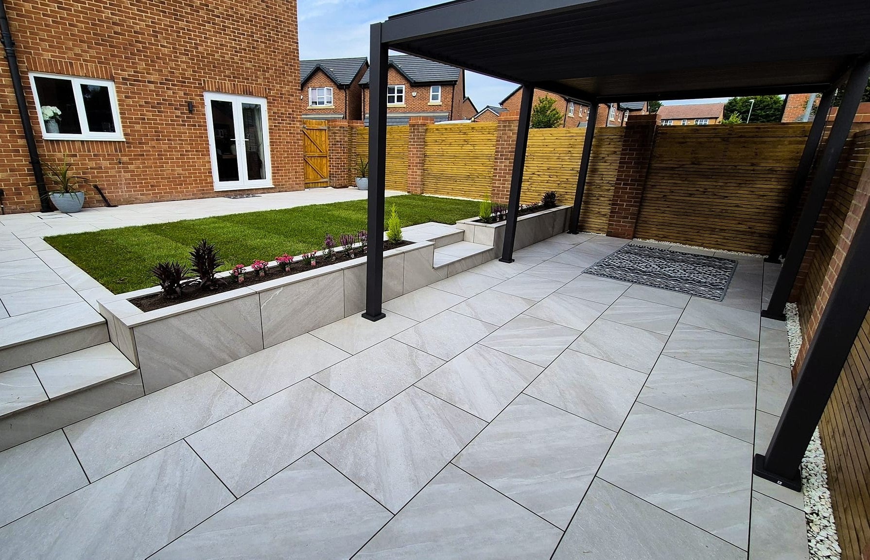 Dome Grey Porcelain Paving Slabs β sleek grey porcelain tiles with a smooth matte finish, perfect for modern and low-maintenance patios