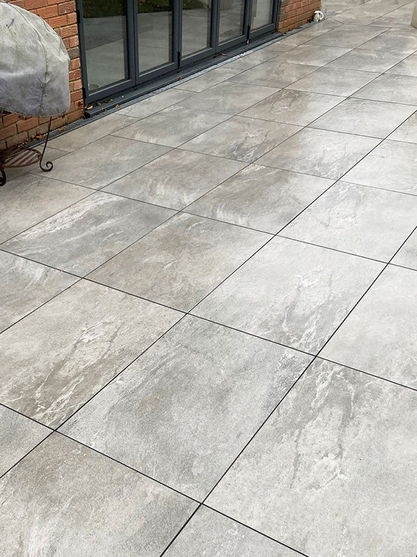 EC Grey Porcelain Paving β Modern light grey tiles with a smooth matte finish, ideal for stylish and low-maintenance patios