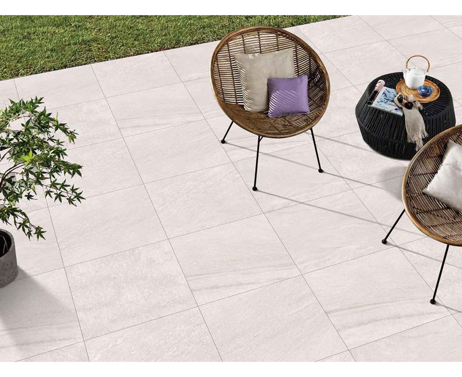 Crystal Pearl paving slabs featuring soft pearly white tones with a smooth natural finish, ideal for elegant and bright patios.