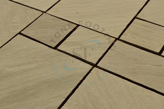 Kandla Grey Indian sandstone paving slab featuring cool grey tones and a naturally riven textured surface, ideal for elegant patios and pathways.