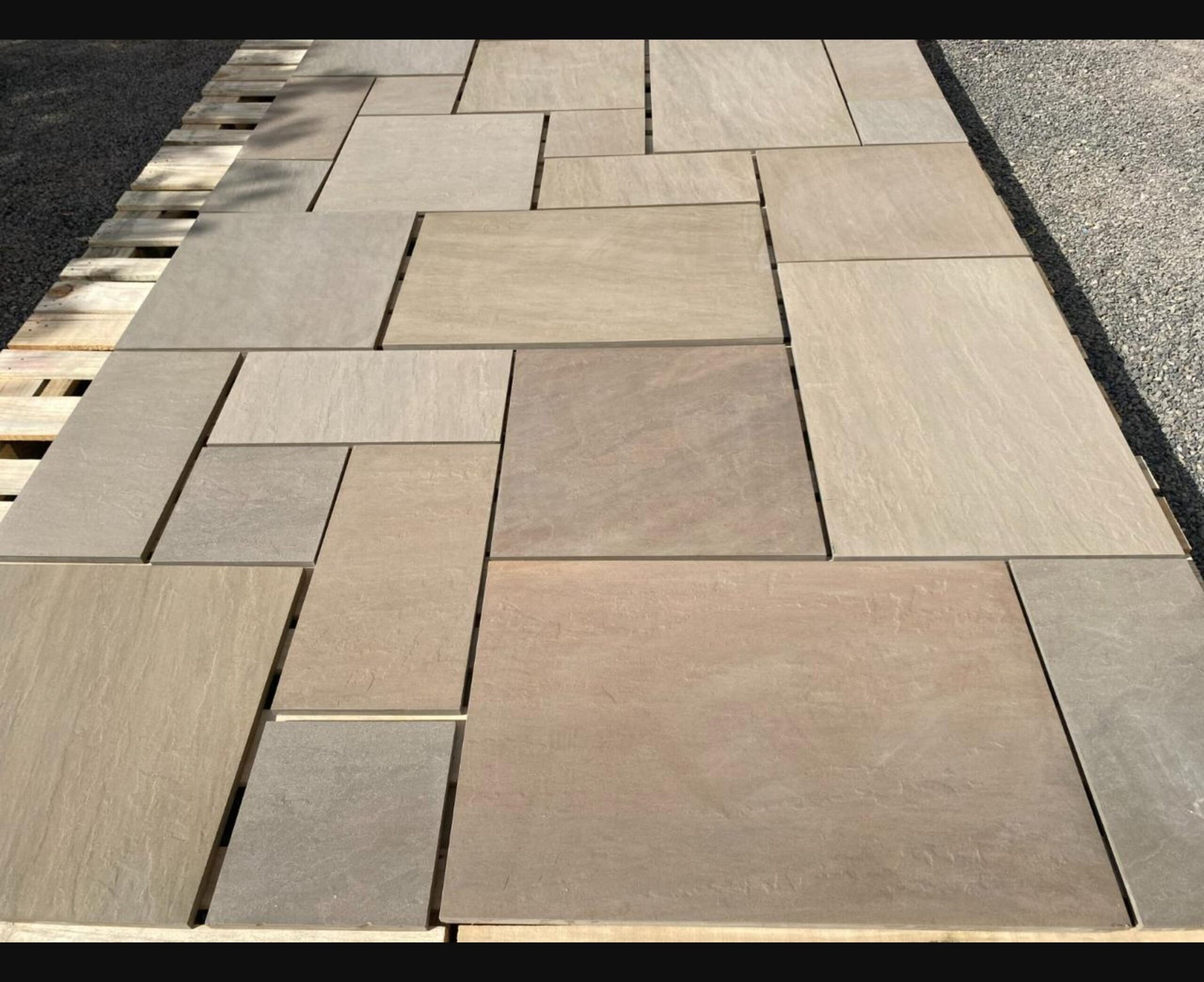 Meadowstone Green patio slabs featuring soft green hues with natural stone texture, ideal for blending outdoor spaces with nature.