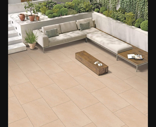 Sandmoor Beige paving slabs with warm beige tones and a subtly textured surface, perfect for creating inviting patios and pathways.