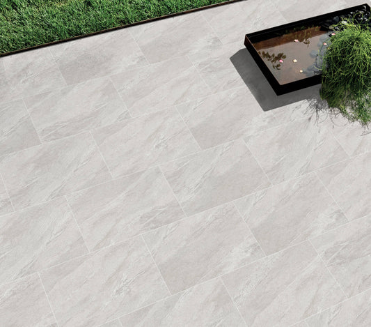 Smoke Grey paving slabs with soft smoky grey tones and a natural stone texture, perfect for contemporary outdoor patios and walkways.