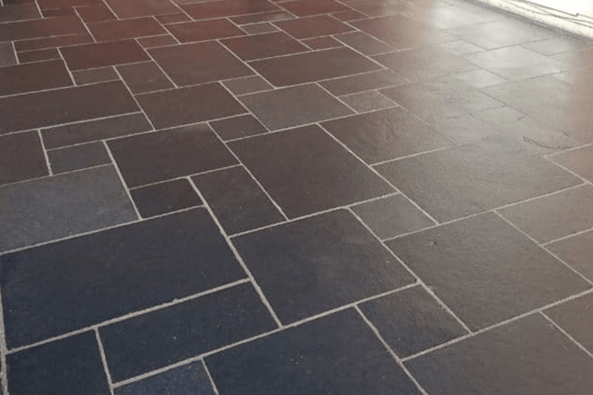 Black Limestone flagstones with rich black tones and a lightly textured finish, ideal for creating bold and contemporary outdoor spaces.