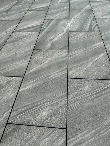 Crossover Grey Outdoor Porcelain Paving Slabs – versatile grey porcelain tiles with a subtle texture, ideal for modern patios and garden spaces