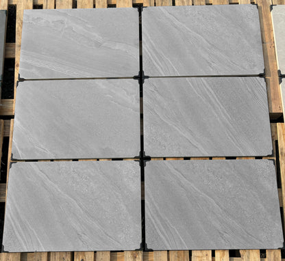 Crossover Grey Porcelain Paving Slabs – medium grey outdoor tiles with a smooth textured finish, perfect for contemporary patios and garden areas