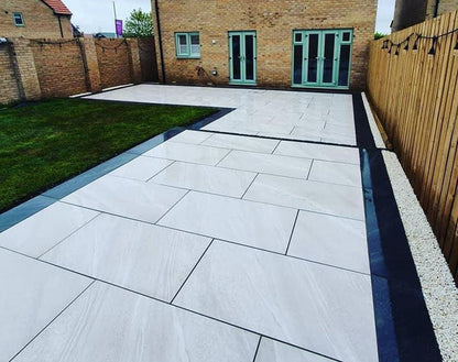 Crossover White Paving Slabs – crisp white outdoor tiles with a subtle textured finish, ideal for modern and low-maintenance patios