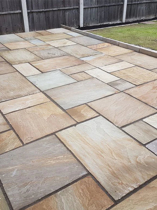 Rippon Buff Indian Sandstone Paving Slabs – Warm multicolour tones with smooth riven texture for patios and gardens